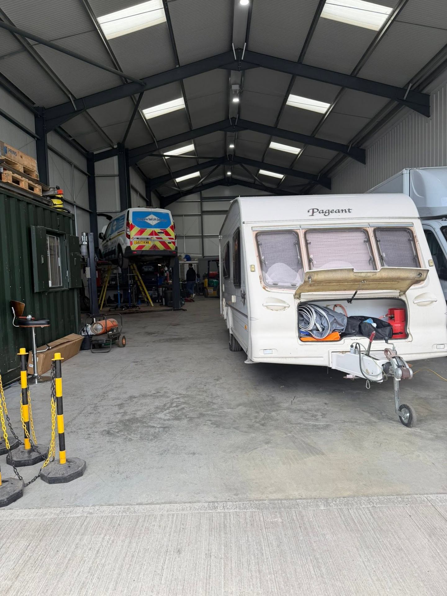 Trailer being inspected and maintained by our mechanics